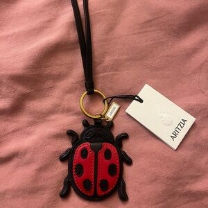 Aritzia Red and Black Ladybug Keychain no longer has tag